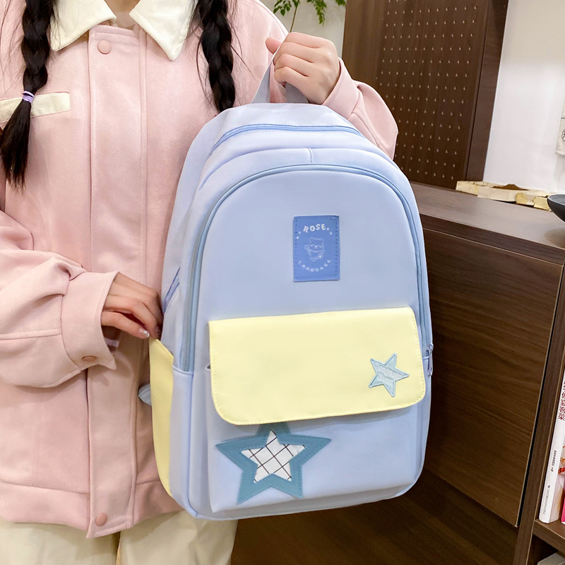 Mochila de estudiante de secundaria para mujer 2025 nuevo estilo ins versión coreana de alta apariencia y gran capacidad para estudiantes de secundaria estilo universitario mochila