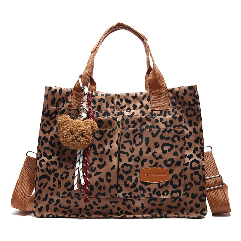 Bolso de lona con estampado de leopardo Bolso especial para mujer Bolso cruzado de gran capacidad en otoño e invierno 2024 Nuevo bolso de viaje de clase de ocio