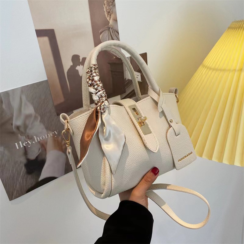 Este año, la popular bolso de mujer de cubo 2024 nicho de diseño de estilo extranjero versátil bolso de hombro simple versión japonesa y coreana