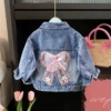 Denim jacket with bow