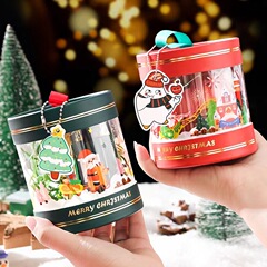 クリスマスのリンゴの包装の箱のクリスマスイブの贈り物の箱は小さい丸い箱の美しい贈り物の贈り物のキャンディーの空の箱を飾ります。