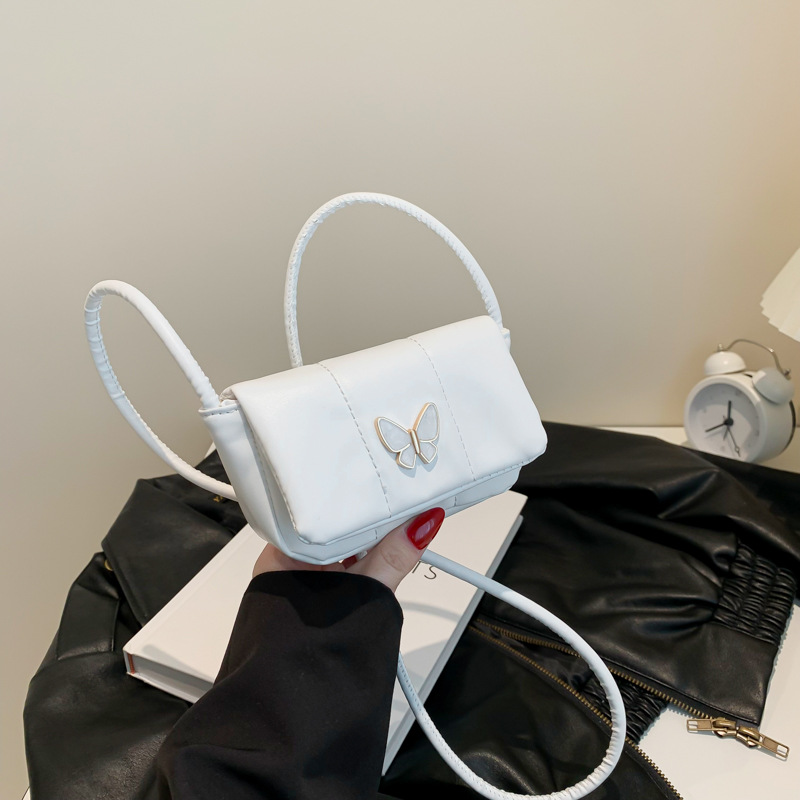 Bolso de axila con decoración de mariposa dulce 2024 textura Bolso femenino popular de este año nuevo bolso diagonal de un solo hombro mini francés