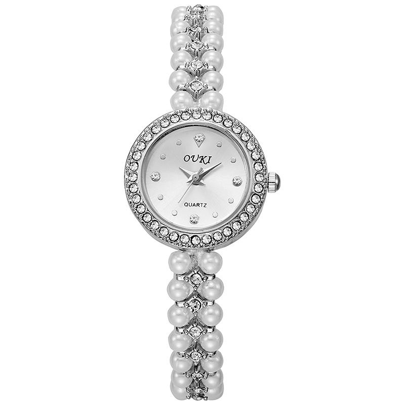 Reloj de pulsera de perlas con cara de gota de agua redonda de lujo ligero transfronterizo moda hecha a mano con cuentas regalo temperamento reloj de mujer al por mayor