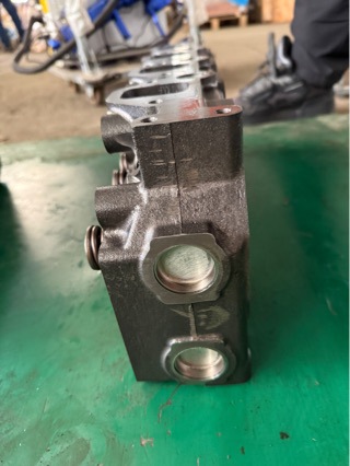 Factory Direct Sales of Td27 Cylinder Head Assembly, Diesel Engine, Four-Cylinder, Cast Iron Cylinder Head Assembly, Td Factory Price