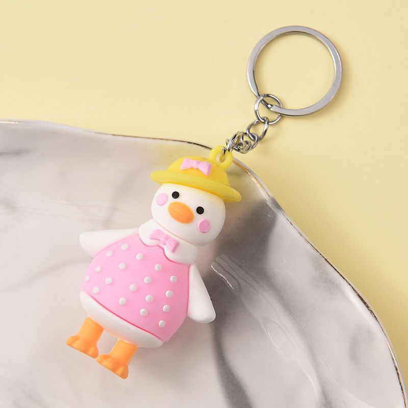 Muñeca de dibujos animados goteo llavero bolsas escolares exquisitas para hombres y mujeres colgantes para agarrar muñecas colgantes para el mercado nocturno regalos al por mayor