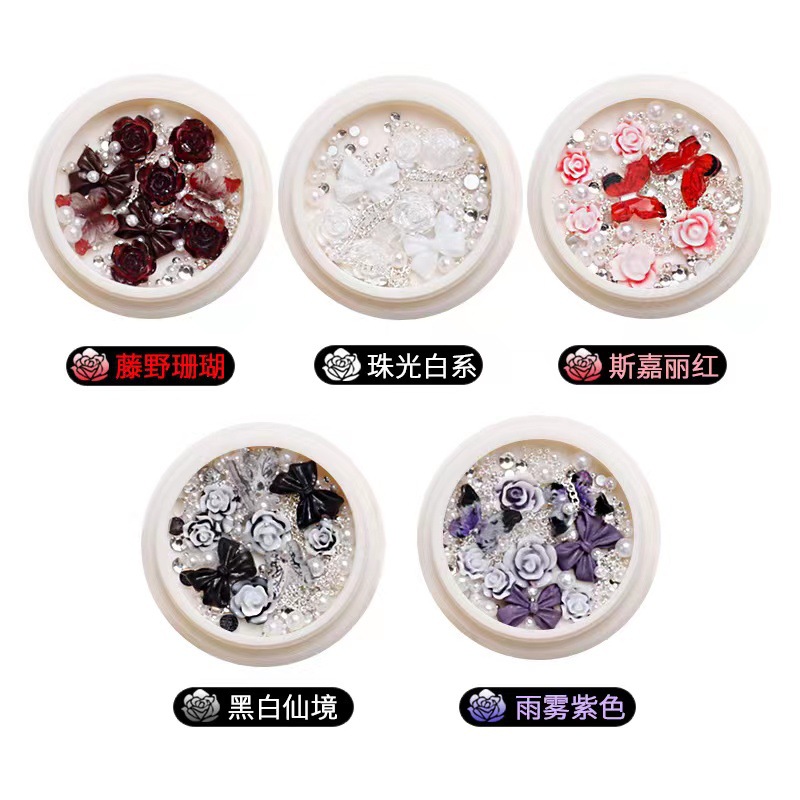 Manicure camellia material paquete de joyería pequeño libro rojo explosión arco mezcla de cadena de joyería de uñas accesorios al por mayor