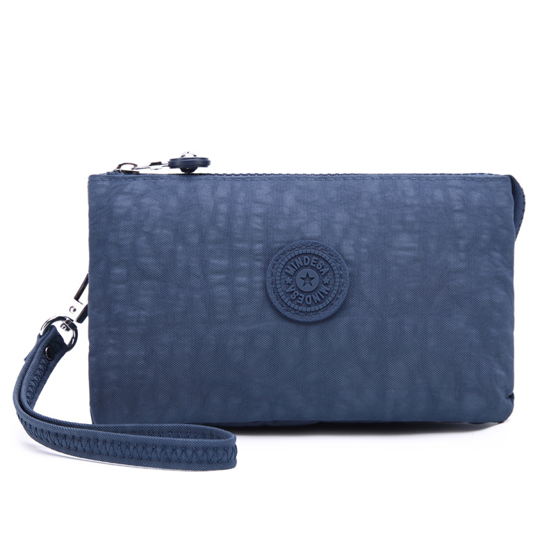 Bolsa de mano de nylon multicapa de gran capacidad a prueba de derrames de agua de mujer simple de moda larga cremallera cambio pasaporte bolso móvil