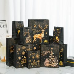 外国貿易の新しいクリスマスの贈り物の袋は国境を越えて携帯用の紙袋のハロウィンの新年のお土産のクリスマスの手提げ袋を提供します。