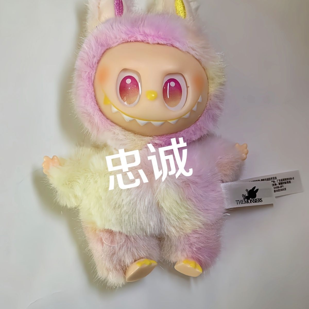 Ventas directas nuevas muñecas de pelusa labubu bra tipo colgante pequeño agarrar muñeca de moda jugar