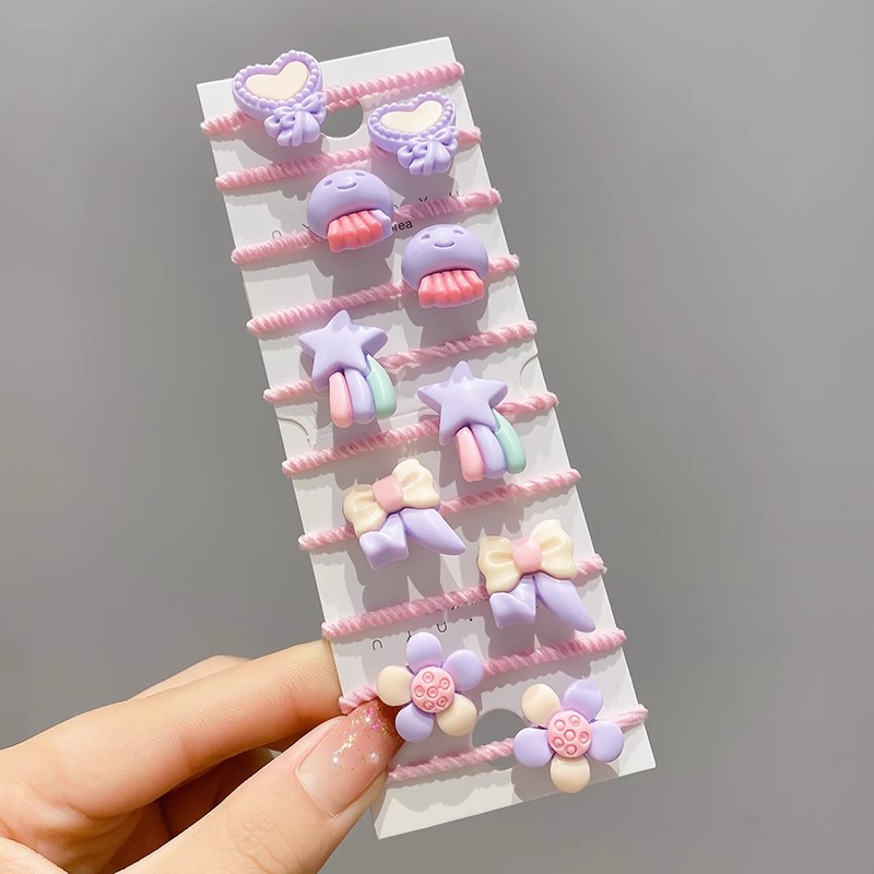 La cuerda del pelo del bebé de las muchachas de la banda de goma de los niños no lastima el pelo Los accesorios del pelo del pulgar del tamaño pequeño atan la banda de goma del pelo