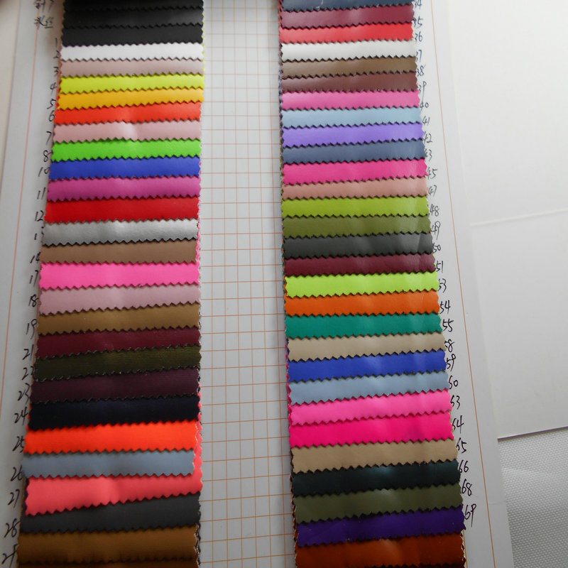 哑面PU弹力底无痕四面弹弹力时装女装布料涤氨弹力淋膜PU里料面料