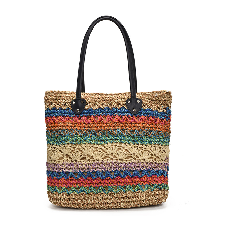 Bolso tejido de arco iris de color de contraste popular de verano femenino 2025 nueva moda estilo étnico bolso tejido de paja gran capacidad sentido de alta gama