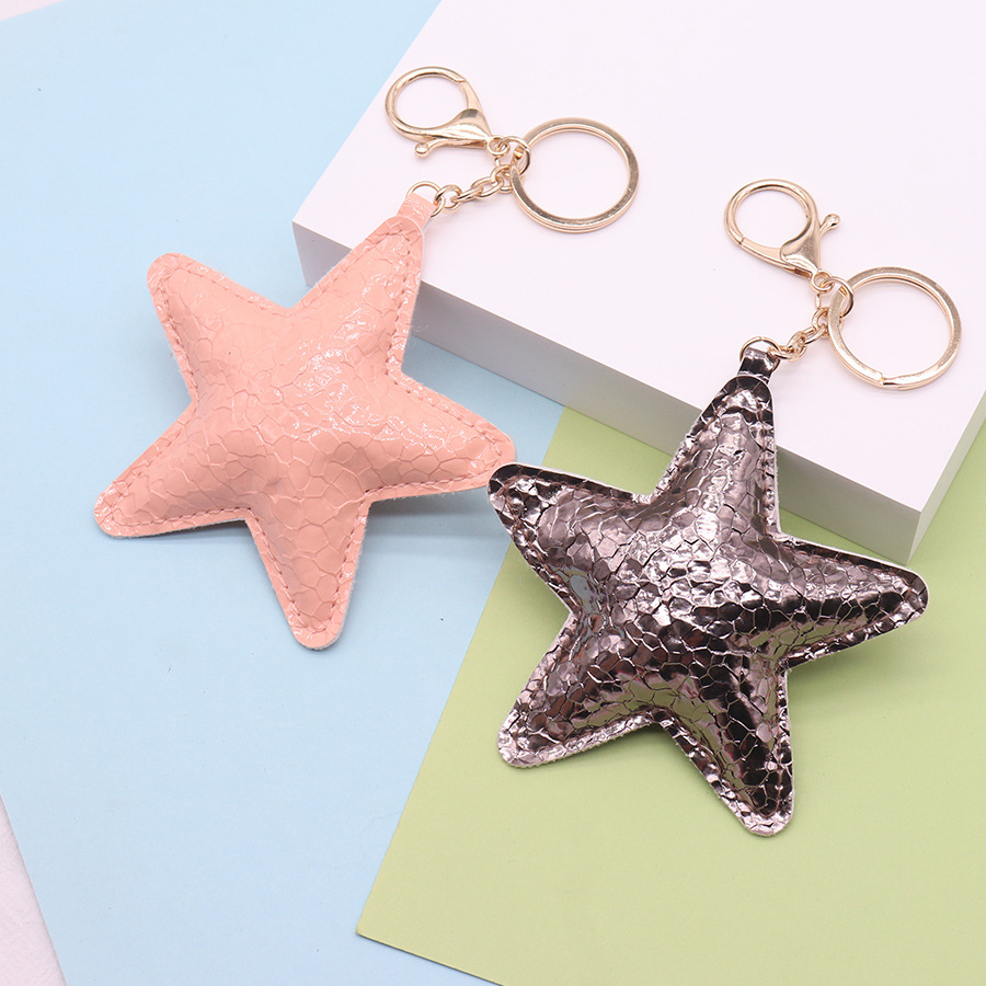 Miu serie estrella de cinco puntas bolso llavero cuero exquisito estrella de cinco puntas colgante de bricolaje teléfono móvil coche colgante mujer