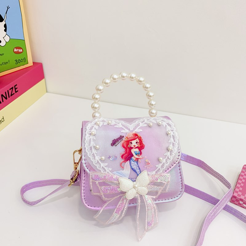 La niña transfronteriza Aisha bolso de hombro de este año, bolso de perla de moda popular, bolso de hombro para niños coreanos.