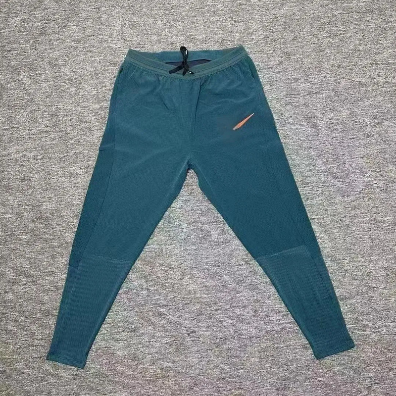 In-Stock Track and Field Quick-Dry Pants, Long Pants, Ribbed Compression Pants, Breathable Zippered High-Elastic Sports Pants for Men's Training and Running In-Stock Track and Field Quick-Dry Pants, Long Pants, Ribbed Compression Pants, Breathable Zippered High-Elastic Sports Pants for Men's Training and Running