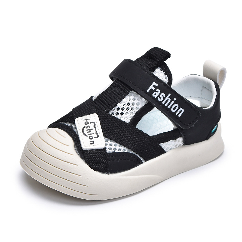 2025 zapatos de red de verano nuevas sandalias para niños de fondo suave Baotou protección para pies hombres y mujeres zapatos para bebés zapatos de marco versión coreana