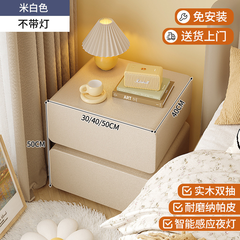 Mesita de noche suspendida, estilo crema, madera maciza con luz, dormitorio doméstico minimalista, sentido de alta gama, armario de almacenamiento junto a la cama, simple y moderno