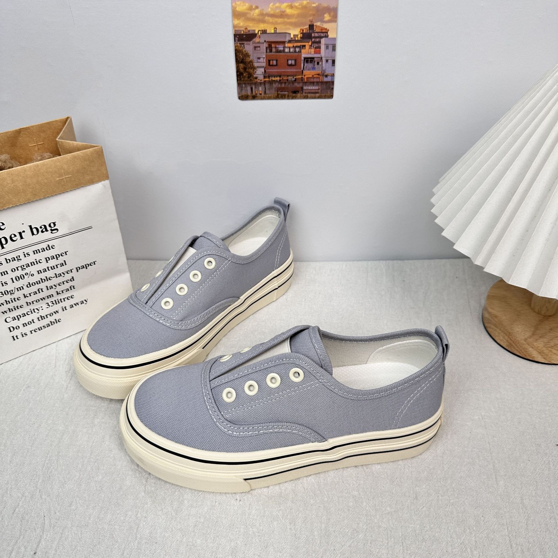 6650 zapatos de lona de color sólido de estilo simple 2025 verano nuevo estilo de un pie zapatos casuales de suela gruesa de corte bajo