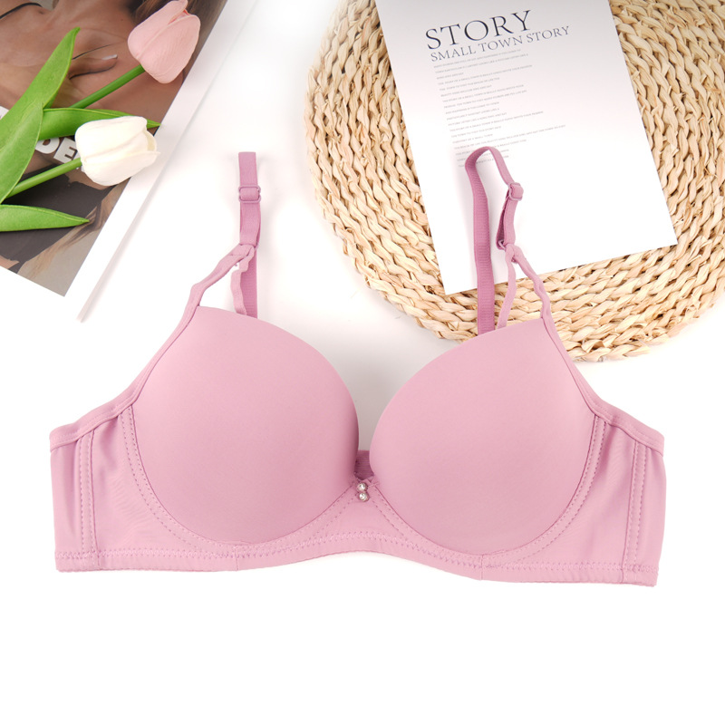 Fábrica de stock de ropa interior lisa sin marcas de pecho pequeño damas juntas sujetador de ajuste de soporte de la niñez sujetador del sudeste asiático
