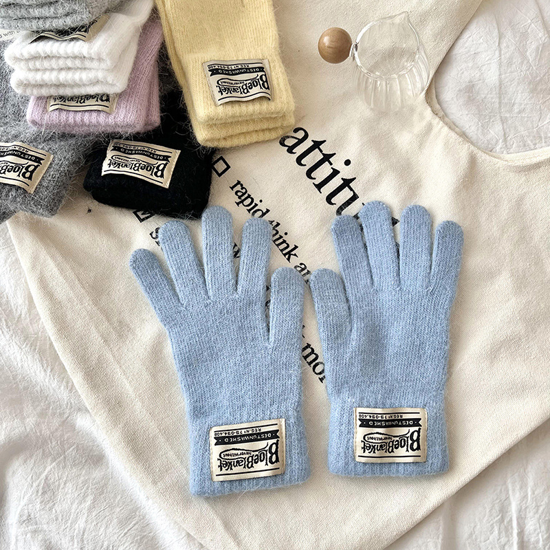Guantes de invierno caliente estilo coreano de color sólido versátil guantes de lana de punto para mujeres a prueba de viento pantalla táctil guantes de dedos al por mayor