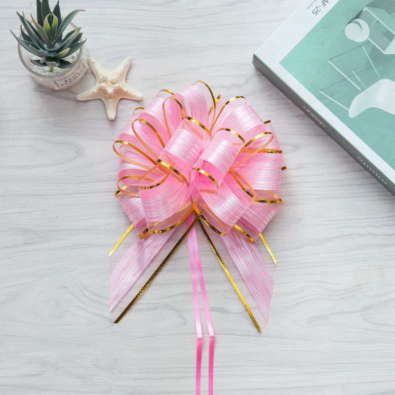 Fábrica directa 50 nuevo hilo de nieve corteza estriado flor de Navidad embalaje de regalos de Hong Kong mano flor perezosa nudo