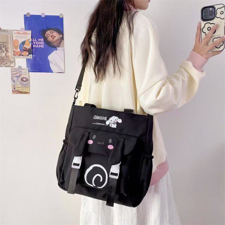 2024 estudiantes bolso de estilo explosivo simple y de gran capacidad nuevo bolso de mensajero de un solo hombro de moda para mujer bolso de viaje