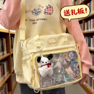 高颜值单肩斜挎包通勤书包吧唧痛包大容量手提包初中学生上课背包