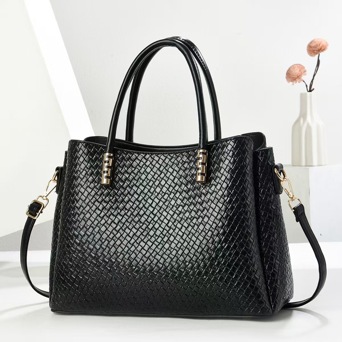 2025 primavera nueva moda todo-fósforo retro de alta gama sentido nicho de gran capacidad mensajero de un solo hombro bolso femenino Tote