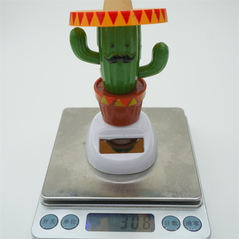 仙人掌汽车装饰自动摇摆件阳能太阳花苹果花摆件公仔太阳能详情20