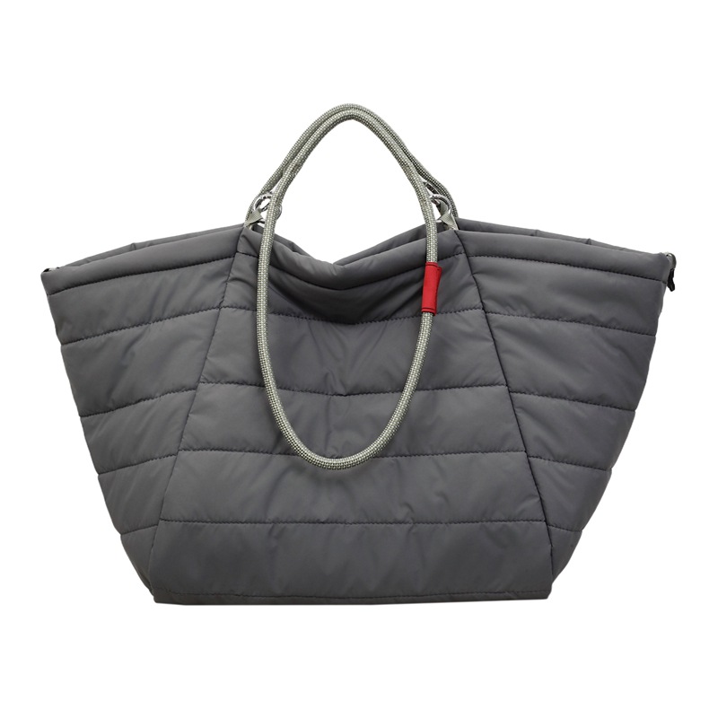 Simple primavera y verano nuevo 2026 nube hombro bolsa de gran capacidad de viaje de viaje de acondicionamiento físico bolso portátil mujer
