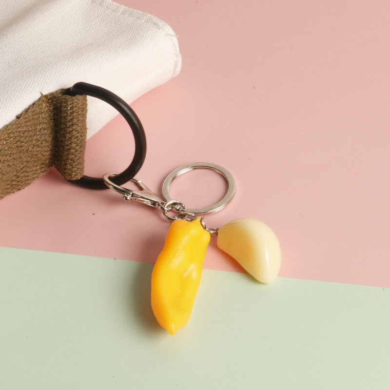 Simulación en stock llavero de ajo creativo anti-perdido llavero de coche estudiante mochila colgante Chili food and play fabricante