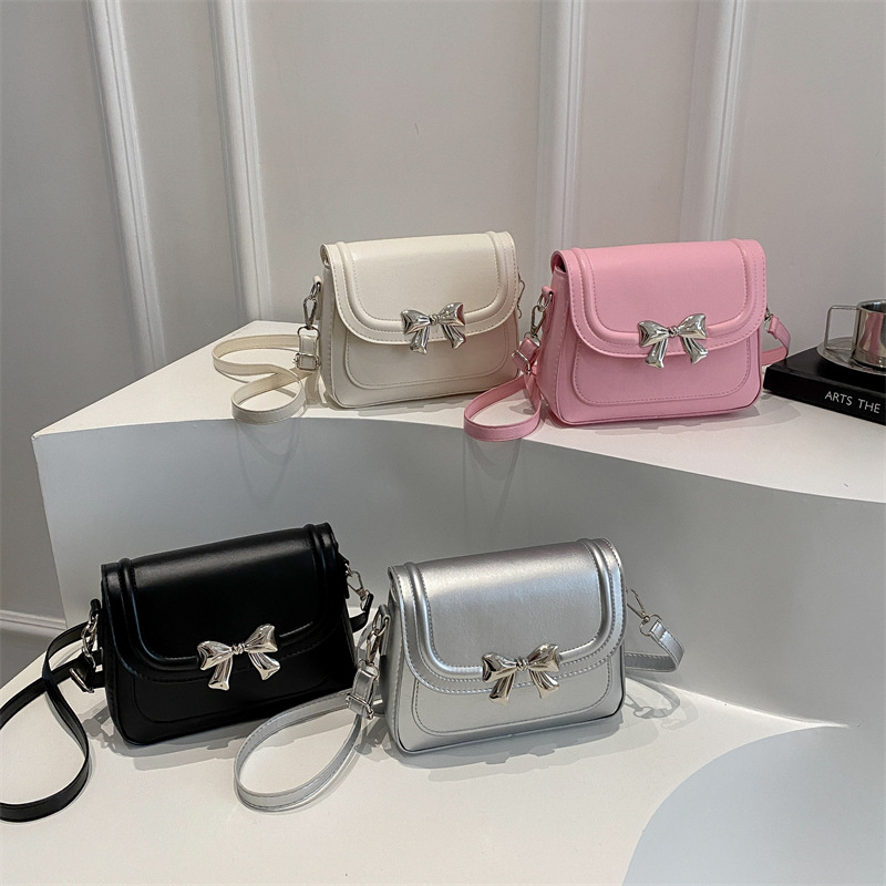 Bolso de lazo de diseño de nicho para mujer 2025 nuevo bolso de mensajero de moda para mujer, dulce estilo occidental, bolso cuadrado pequeño para mujer