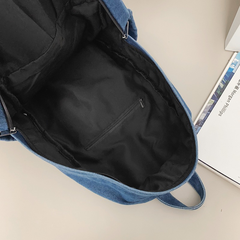 Mochila de mezclilla de gran capacidad para estudiantes de secundaria para mujeres, bolsa de viaje ligera, mochila de ocio estilo de Hong Kong, mochila al por mayor