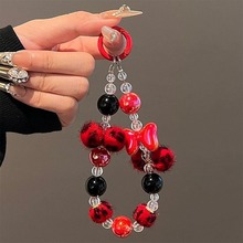 ���Ա���ë�������̿�߼��е����������������ֻ�����������Я