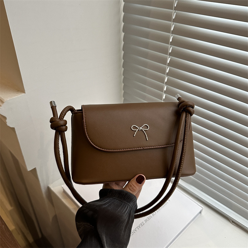 Bolso de brazo de nicho coreano para mujeres 2024 nuevo estilo de moda bolso de mano de palo de moda alta sensación multifunción mochila