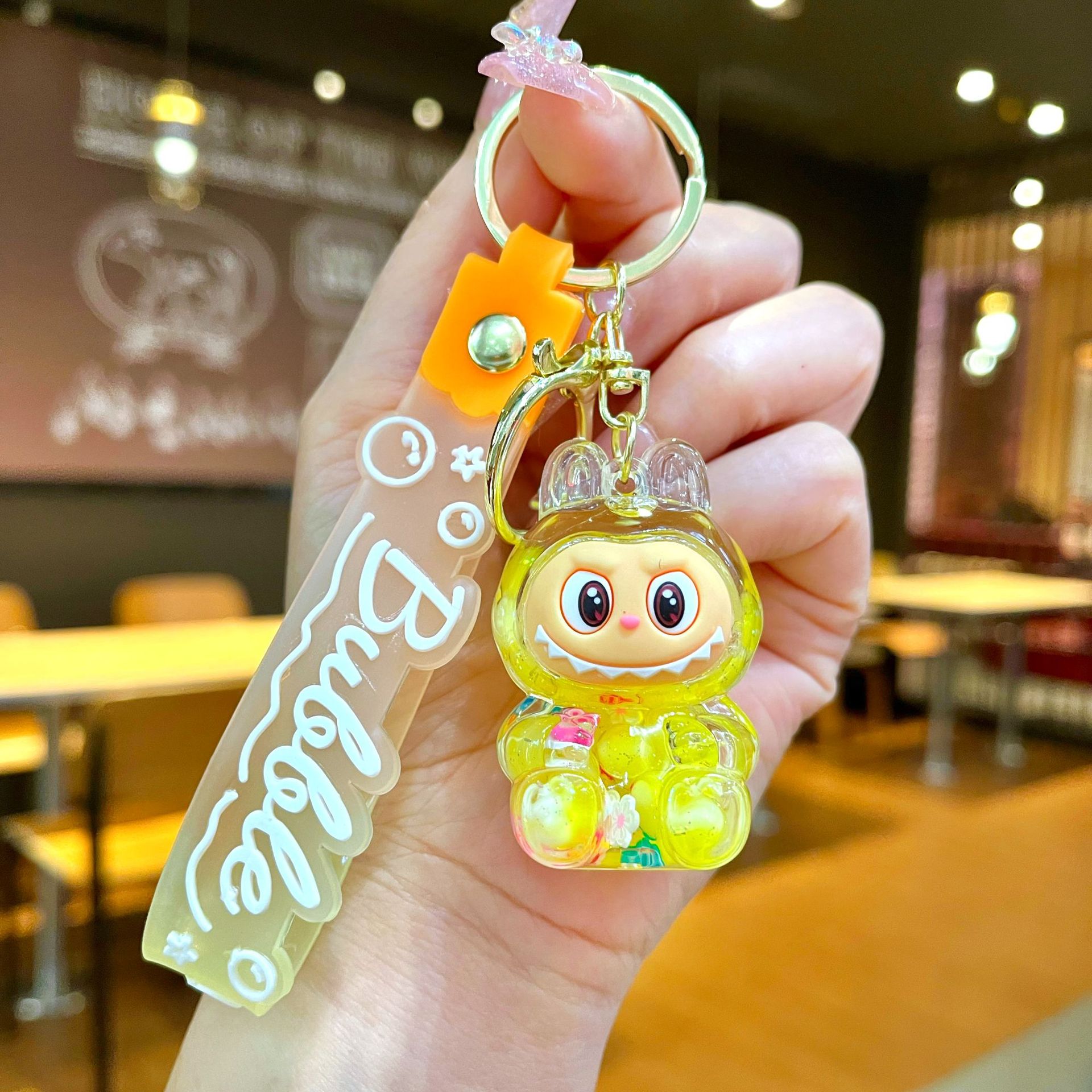 Llavero red acrílico con arena flotante