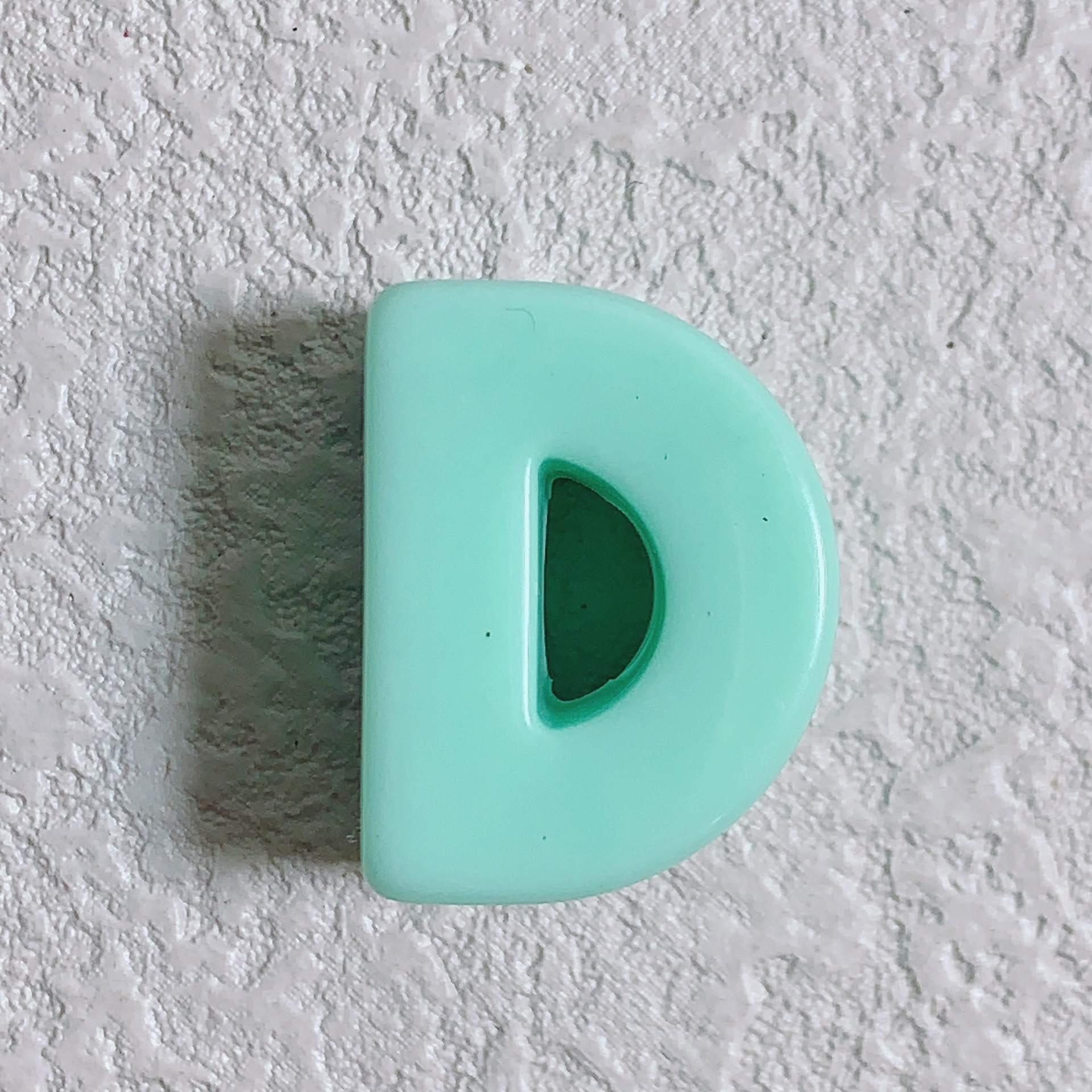D (turquoise)