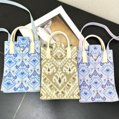 新款针织百搭手机包单肩斜挎便携艾莱德斯设计花纹旅游手拎包