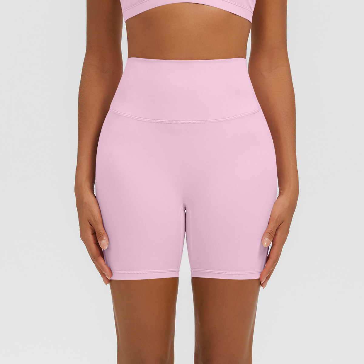 Nuevo tipo delgado de hielo, piel transpirable, ajustado, color sólido, ropa de yoga, pantalones cortos de tres puntos.