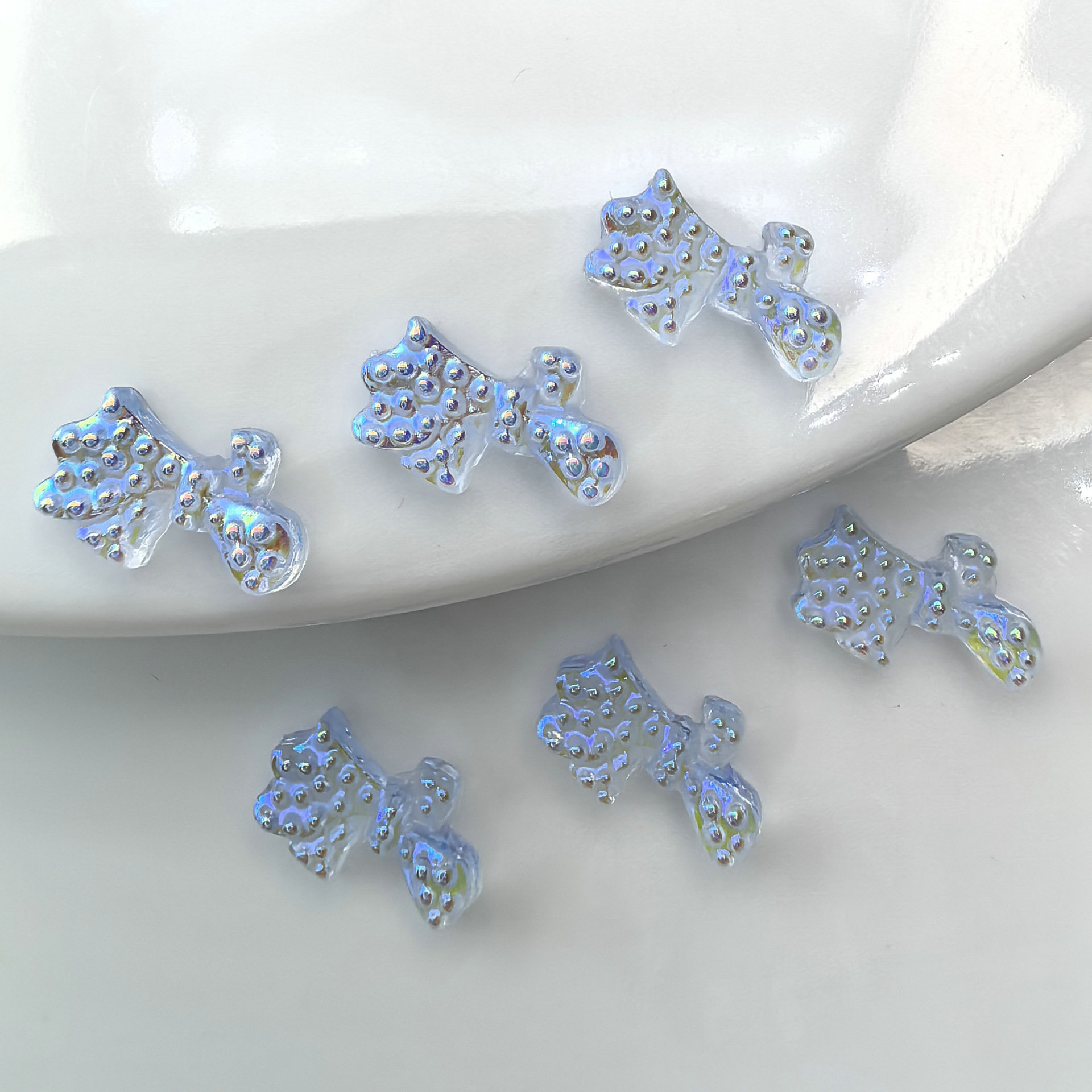 浅蓝色蝴蝶结美甲饰品批发海口重庆天津广州香港0006.jpg