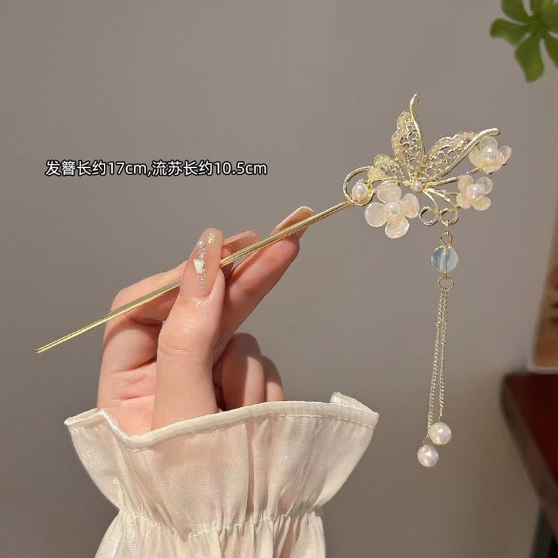 Temperamento de mariposa estilo antiguo paso a paso horquilla Hanfu traje antiguo tocado de alta calidad sensación horquilla de pelo femenino estilo chino borla horquilla