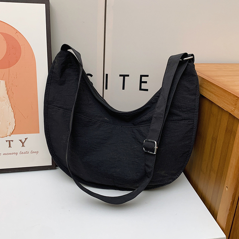 Bolsa de hombro coreana para niños y niñas de color sólido de gran capacidad bolsas de饺os para niños 2025 nuevas bolsas para niños con colgantes