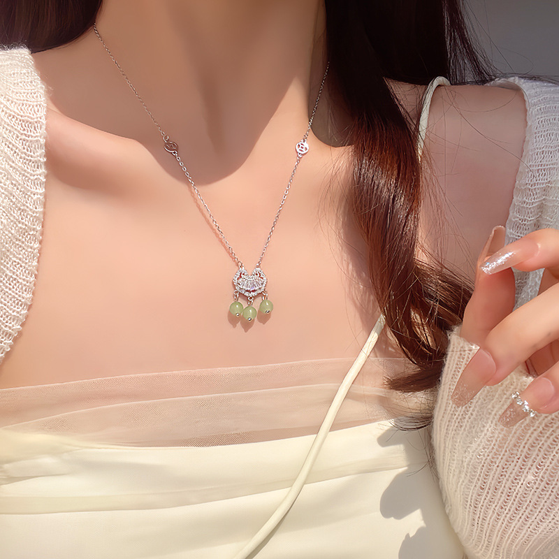 Retro sophisticated protective amulet with zircon