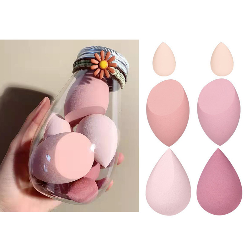 Traje de viaje portátil polvo puff PET embotellada belleza huevo súper suave embotellada mejorada esponja polvo puff leche té enlatado color