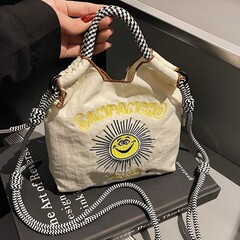 日系ボールチェーン同項環境保護刺繍ショッピングバッグナイロン布花手提げ小衆ファッションショッピングバッグ