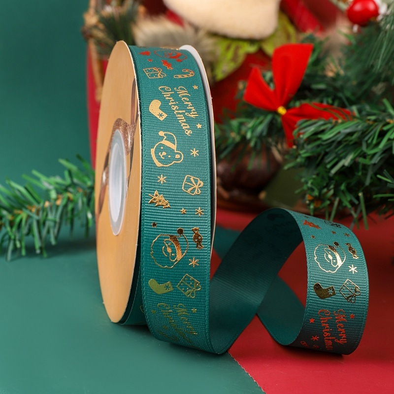 クリスマスリボン卸売 2.5cm クリスマスリボン メリークリスマス文字金箔入りリボン|undefined