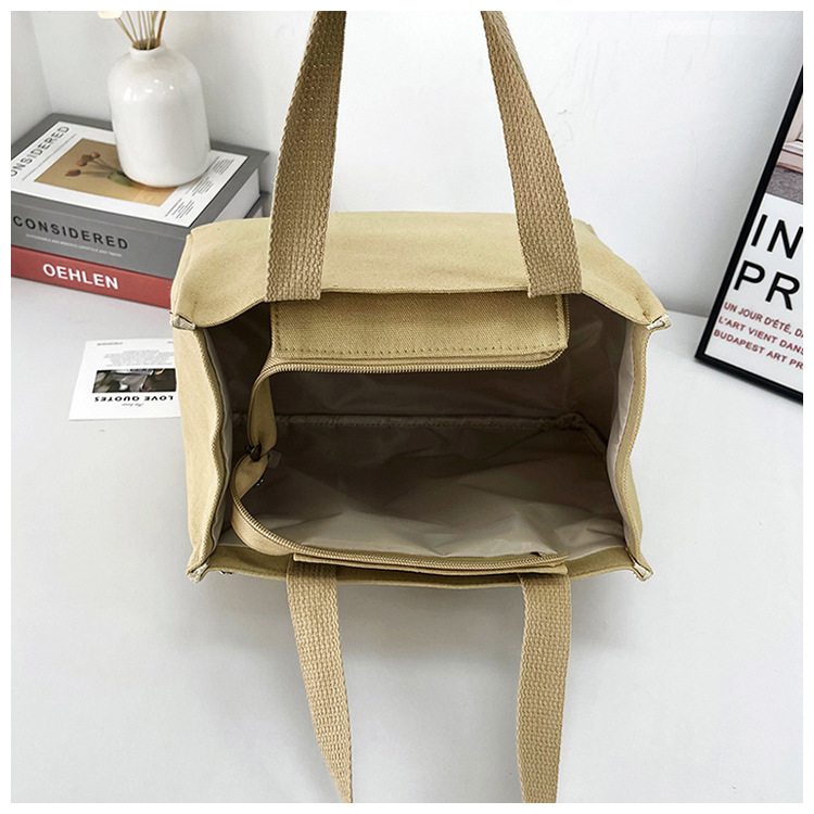 New wholesale fashionable and high-quality canvas handbag, simple and portable, easy to carry for going out, versatile lunch box and bento bag undefined