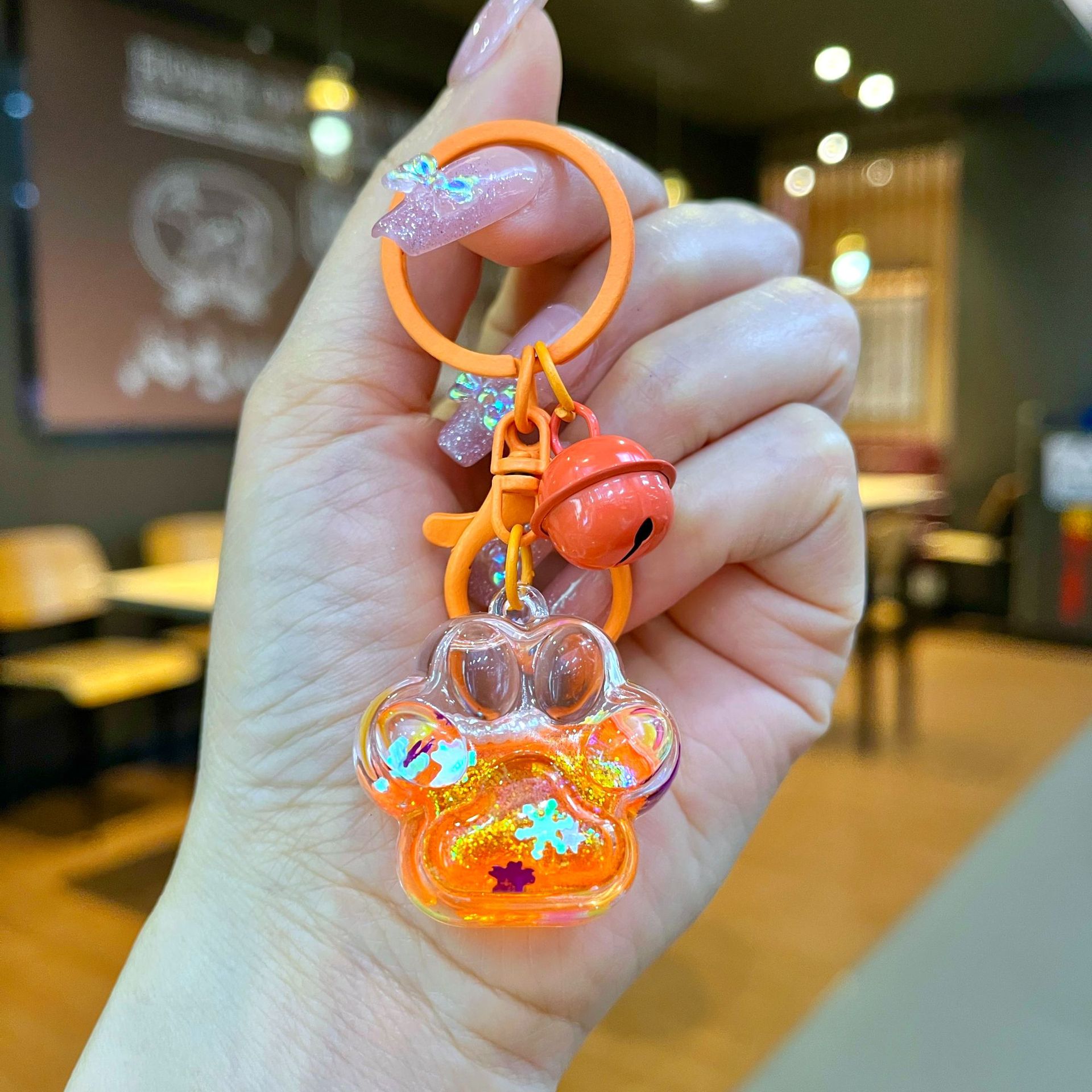 Aceite de gato garra arenas movedizas llavero lindo dibujos animados cadena colgante captura muñeca máquina agarrar pequeño regalo al por mayor