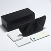 White sunglasses, blue box, black tape, case, glasses, 2021 collection