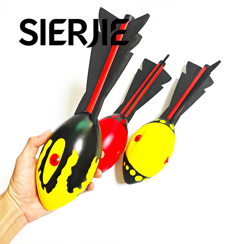 Modelo superventas: bola de misil volador, bola de espuma PU con silbato, bola de dardos, bola cohete, bola con silbato, bola para lanzar, envío directo del fabricante de Dongguan.